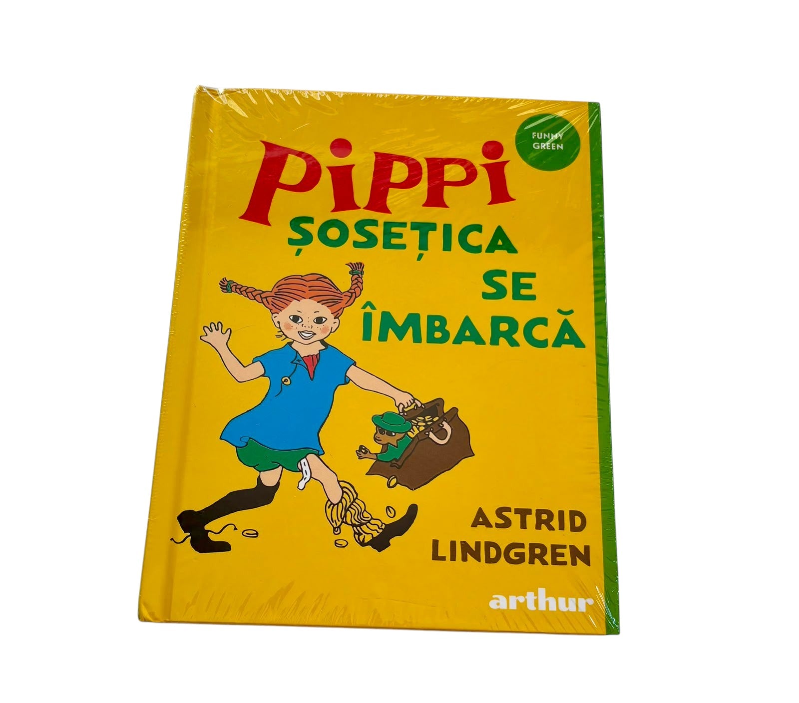 theBookHive Pippi Șosețica se îmbracă by Astrid Lindgren, a yellow children's book from the Funny Green collection